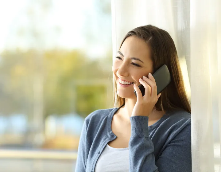 A woman talking on a cell phone